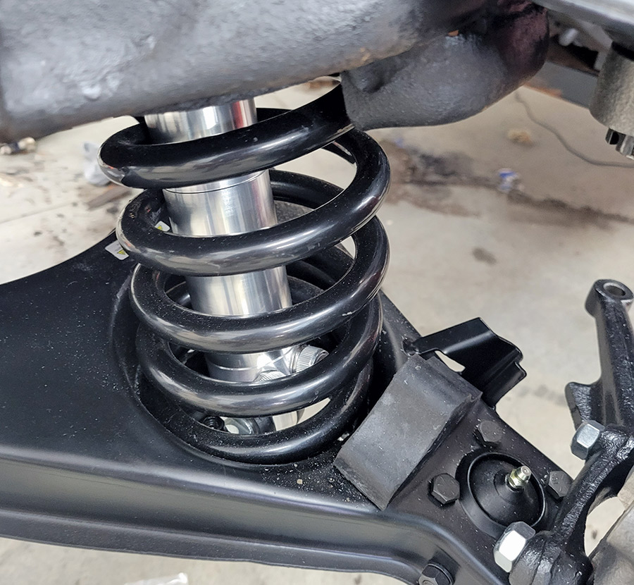Along with the front shock absorbers, a fresh set of stock-height coil springs were installed along with new rubber snubbers.