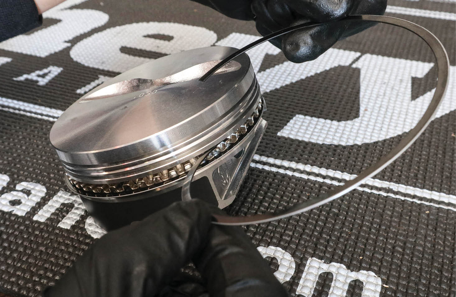 We had to carefully remove the oil rings we’d already installed on the first piston in order to actually fit the piston to the rod—oops!