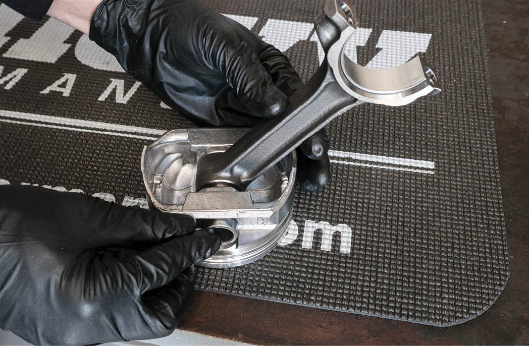 With that mishap sorted out, we proceeded to coat the wristpins with engine assembly lube and install the rods on the pistons, securing them with the provided C-clips