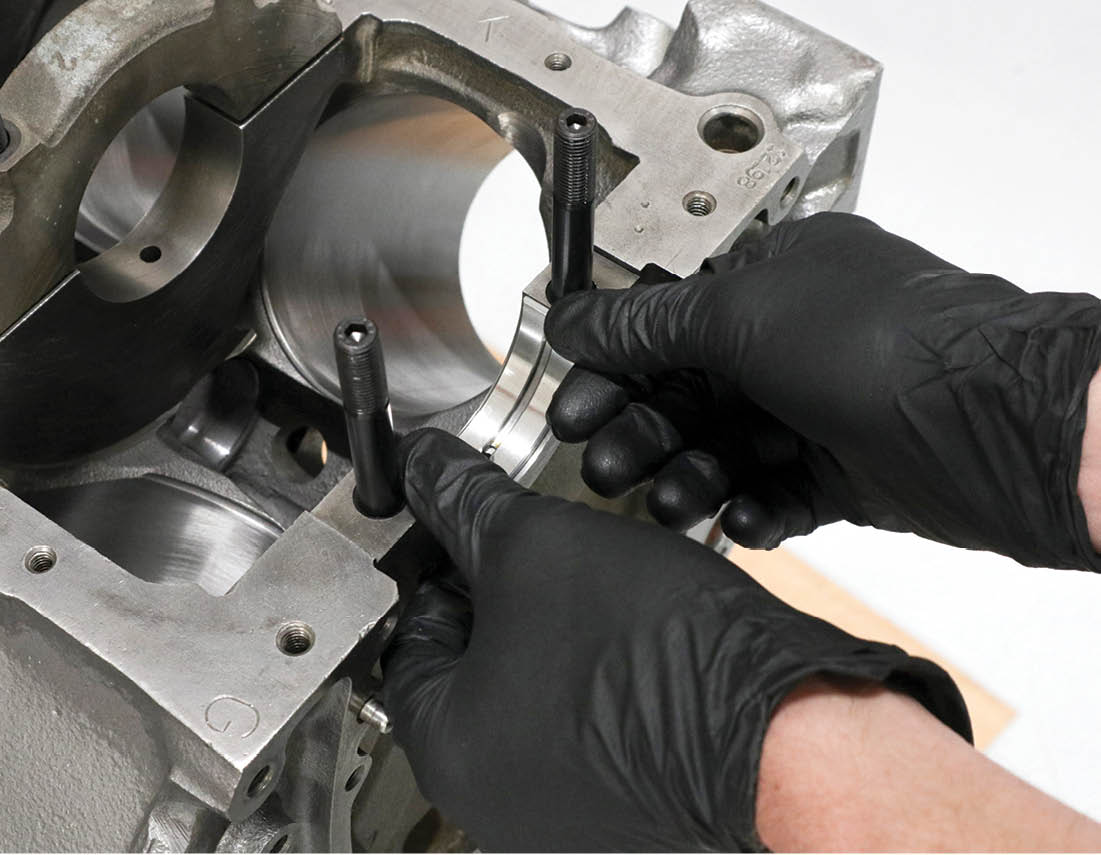 installing our ARP main studs and the 0.030-inch over main bearings provided by Speedway Motors