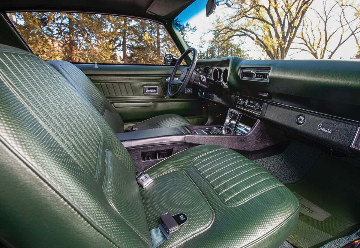 green leather front seat interior in a '71 Camaro