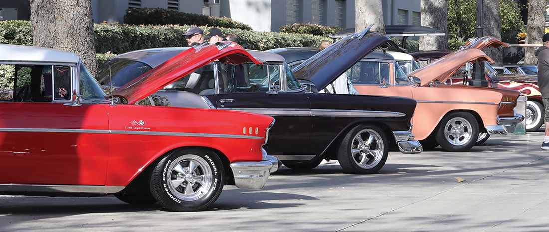 Row of Bel-Airs outside with open hoods