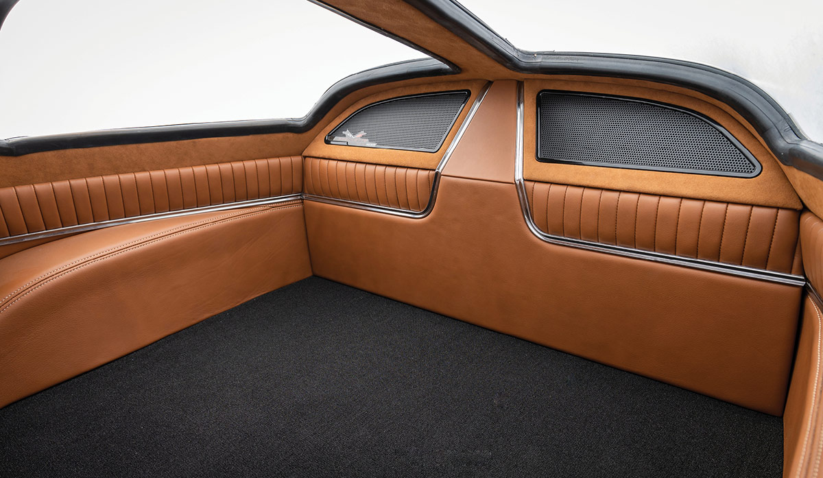 Custom upholstered and carpeted trunk area