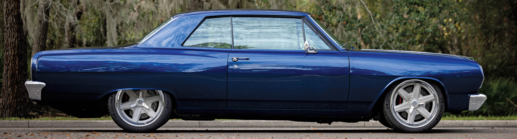 passenger side of a blue ’65 Chevrolet Chevelle Malibu SS