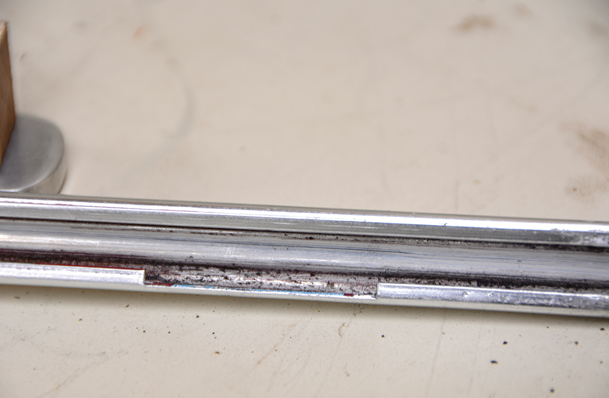 Certain areas of the trim are notched to allow the clips to slide in. These areas allow easy access with chasing chisels to knock out the dings. If there is extreme damage that needs serious attention, you could carefully notch out an area like this as a last resort.