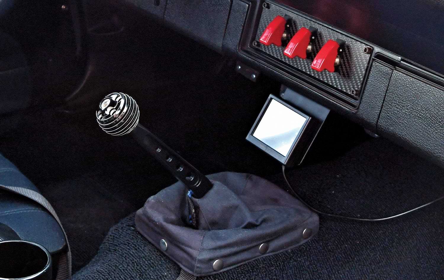 the ’71 Camaro Pro Tourer's gear shift and lower dashboard toggles