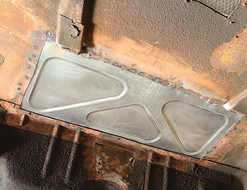 To also take care of some butchered holes from previous owners, Cantrell fabbed up this floorpan section, adding a few raised sections for improved strength.