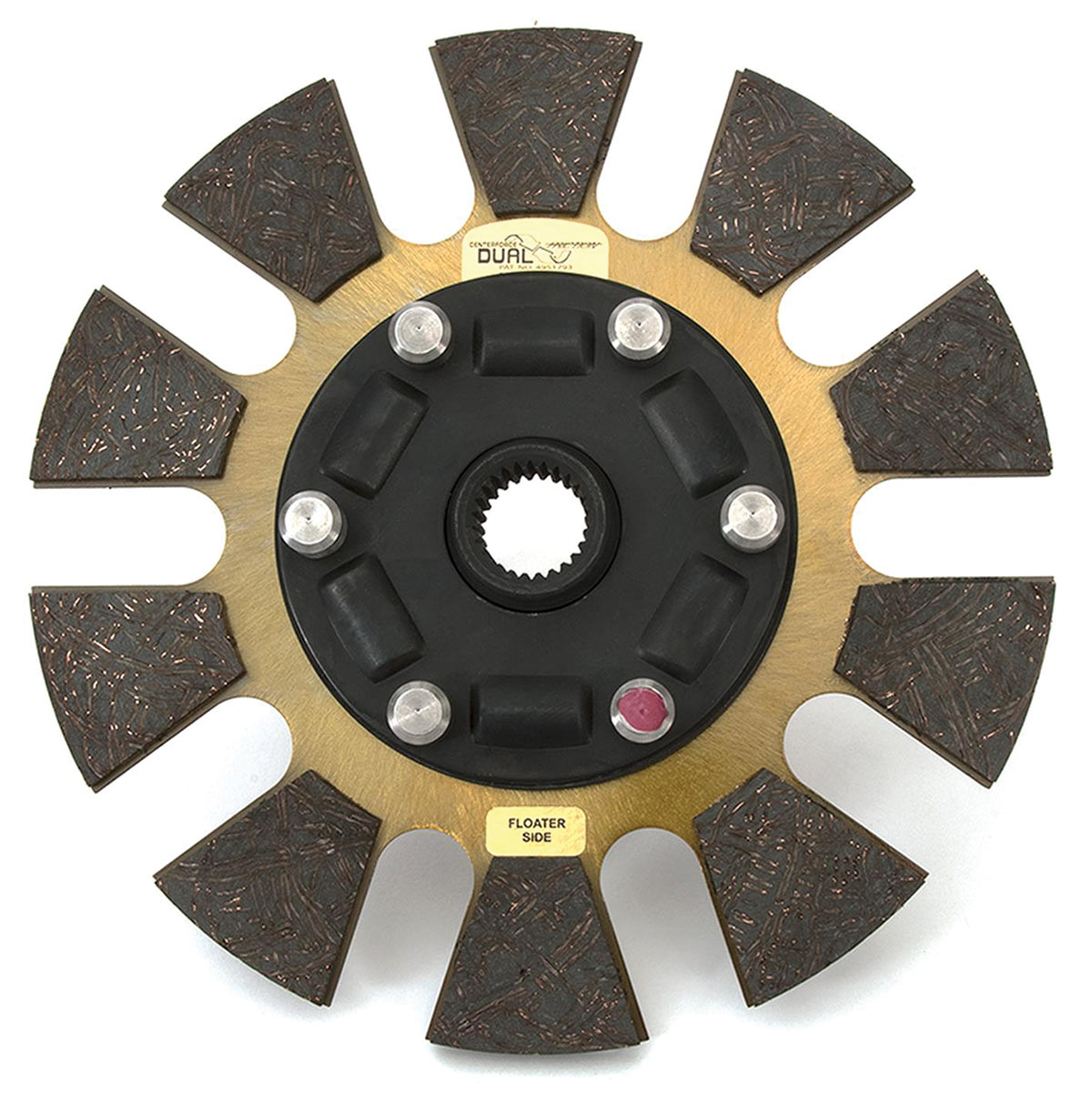 This image of one of the two discs from the Centerforce DYAD system reveals how the company reduces clutch disc weight by using a serrated face with 10 separate pucks. This trims the mass around the outside of the disc, reducing overall force at any given engine speed.