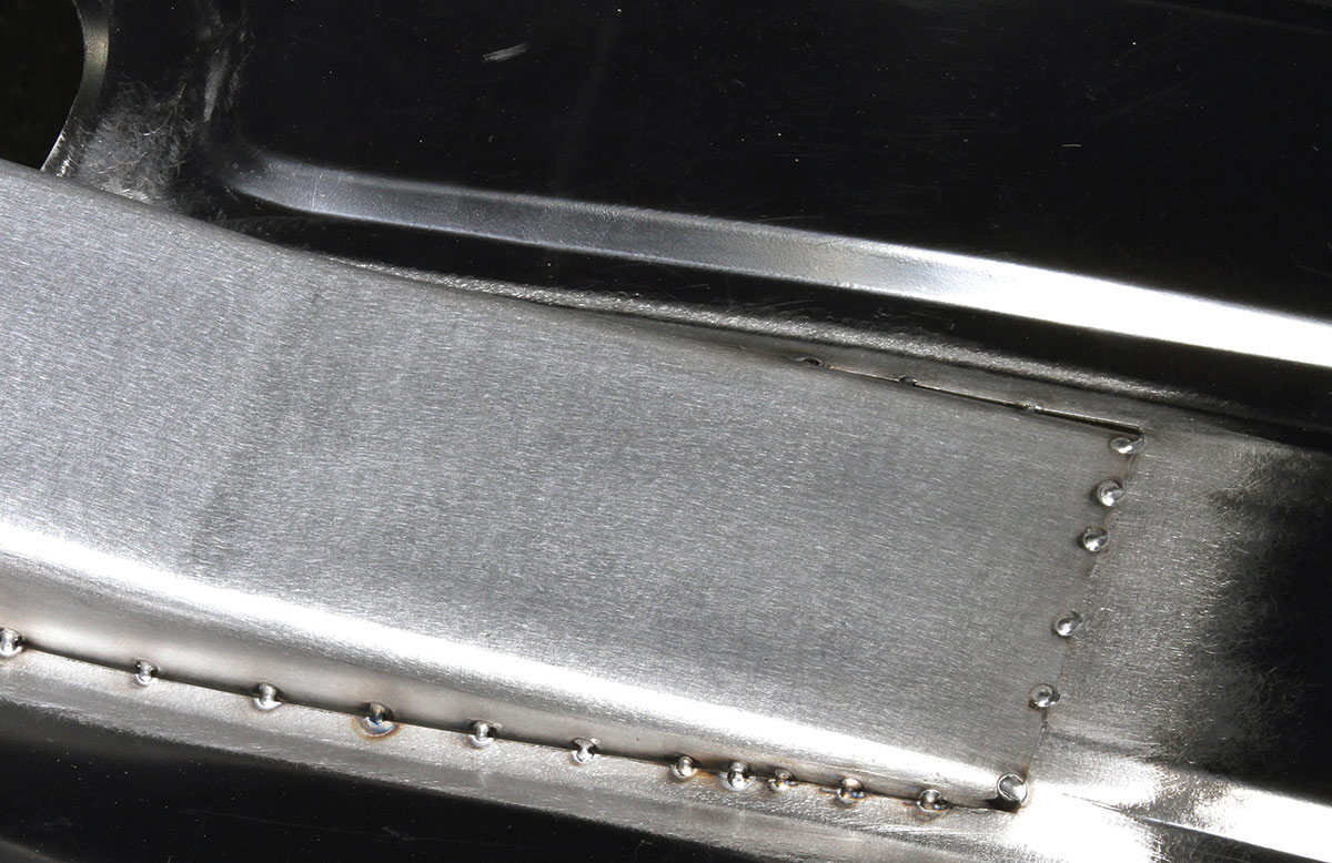 Here are the basic tack welds that hold the connector in place. After this, it’s simply a matter of filling in the welds around the perimeter. It’s a time-consuming and painstaking process that requires great attention to detail.