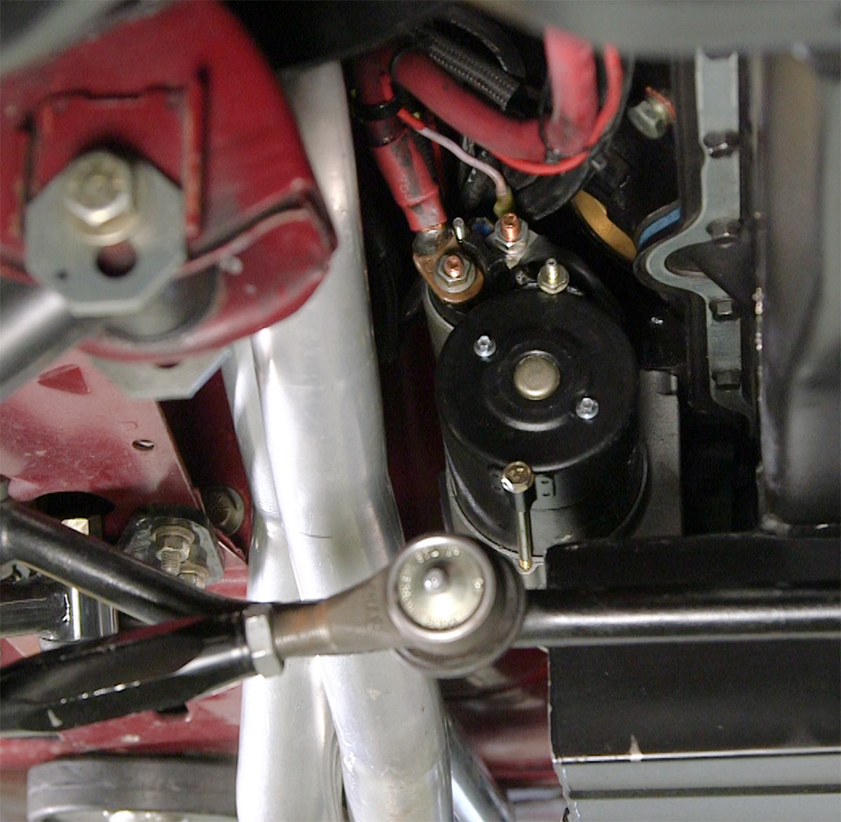 Here is a gear-reduction starter. The small size makes installation easier and provides room for headers.