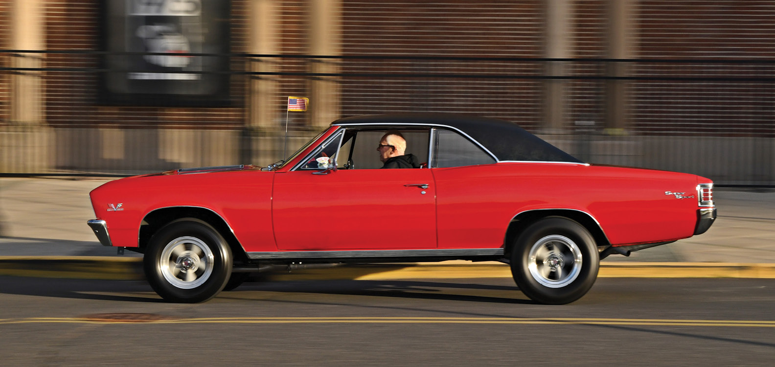 driving view of red ’67 Chevelle Super Sport