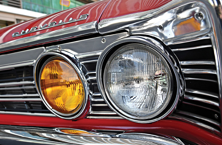 headlight of red ’67 Chevelle Super Sport