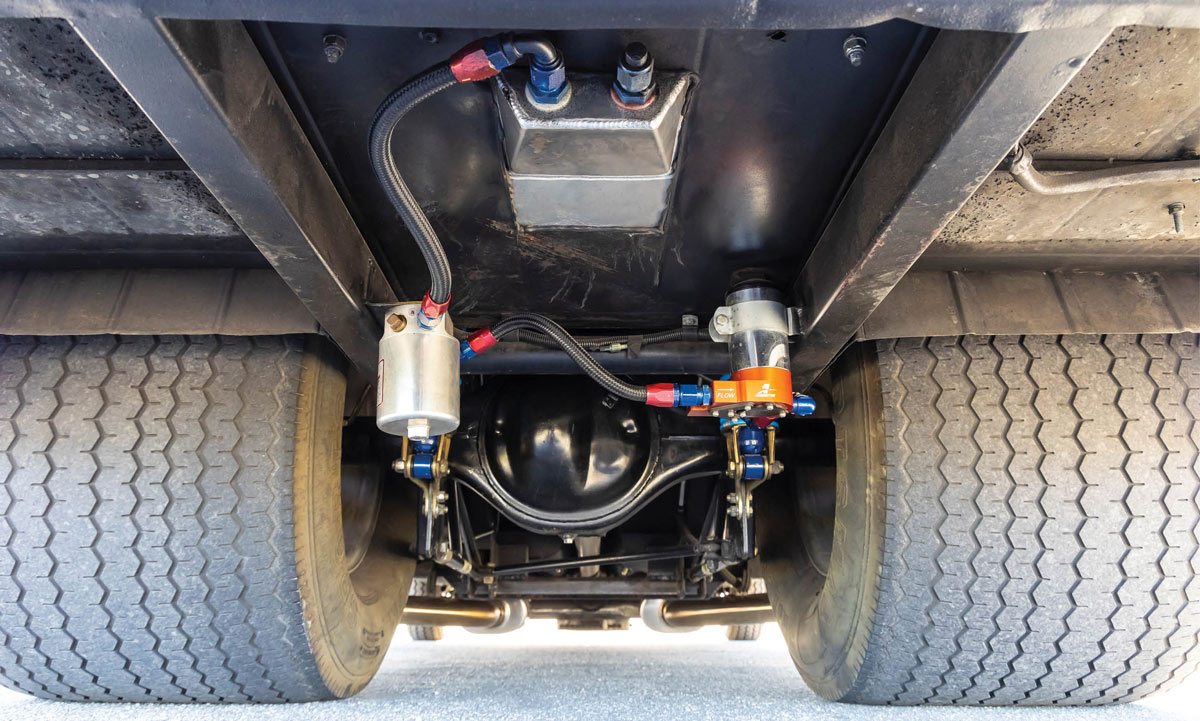 underneath a ’64 Chevrolet Nova SS