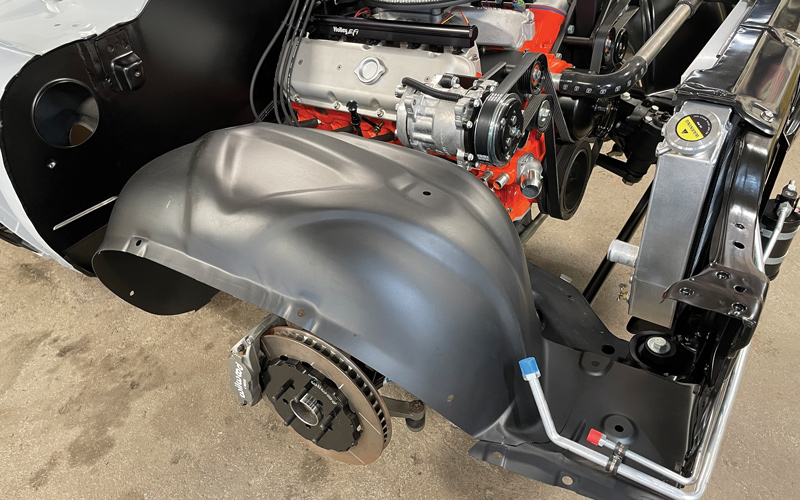 Here you can see just how perfectly everything is coming together thanks to the combination of a completed radiator core support, inner fenders, and cooling system.