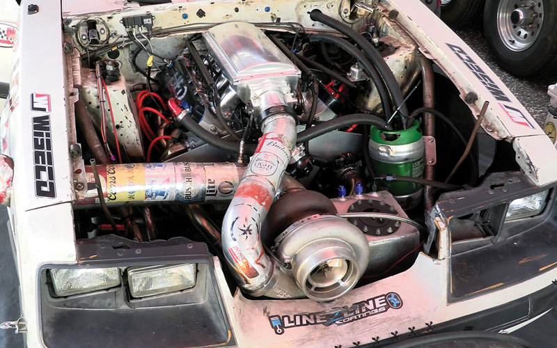 This is how to make a Mustang go fast. Beer Money is one of the most successful cars in no-prep drag racing, and it depends on an LS engine being fed big boost by a Precision turbo.