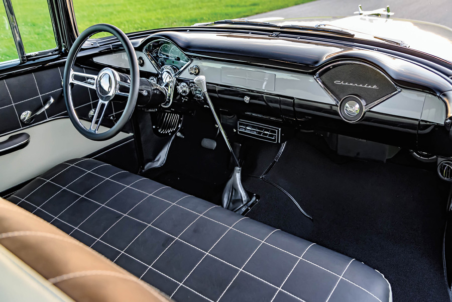 interior, steering, and dash in a ’55 Chevy 210