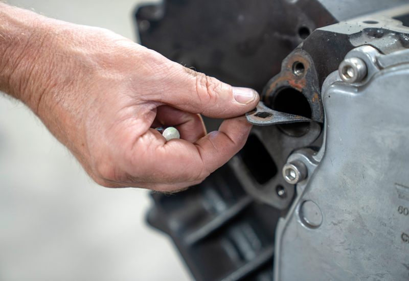 Prior to getting started, remove all old gaskets and be sure to clean the entire mating surface with a gasket scraper and brake cleaner to ensure the new gasket will seal properly.