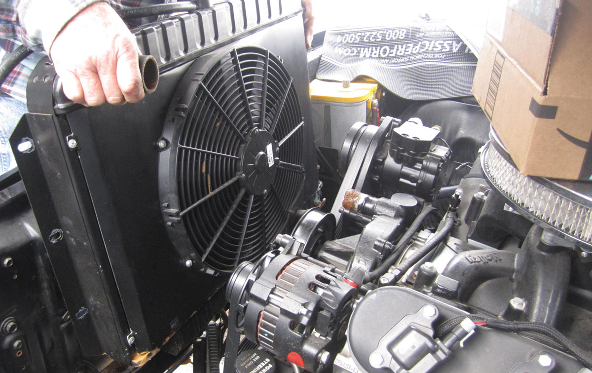 Installing fan onto condenser
