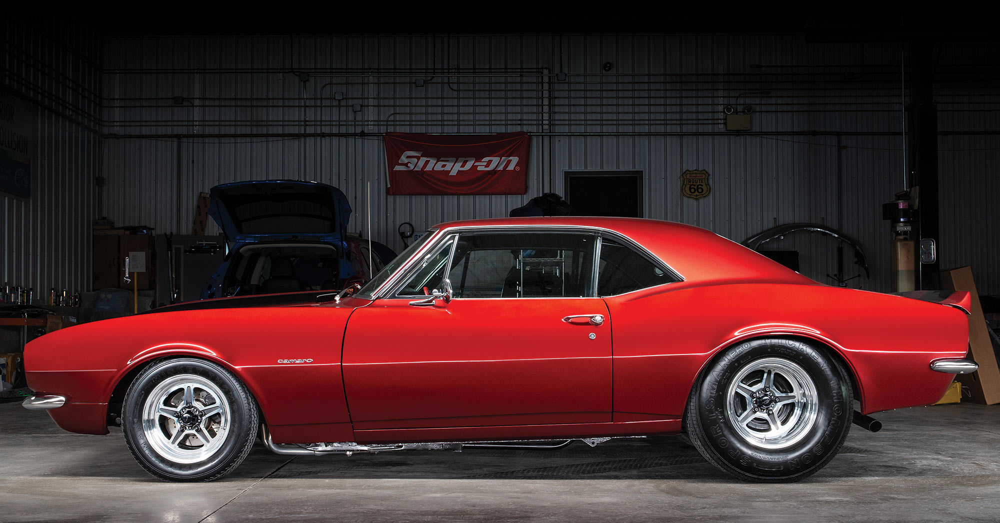 Side view of the '67 Camaro SS in garage