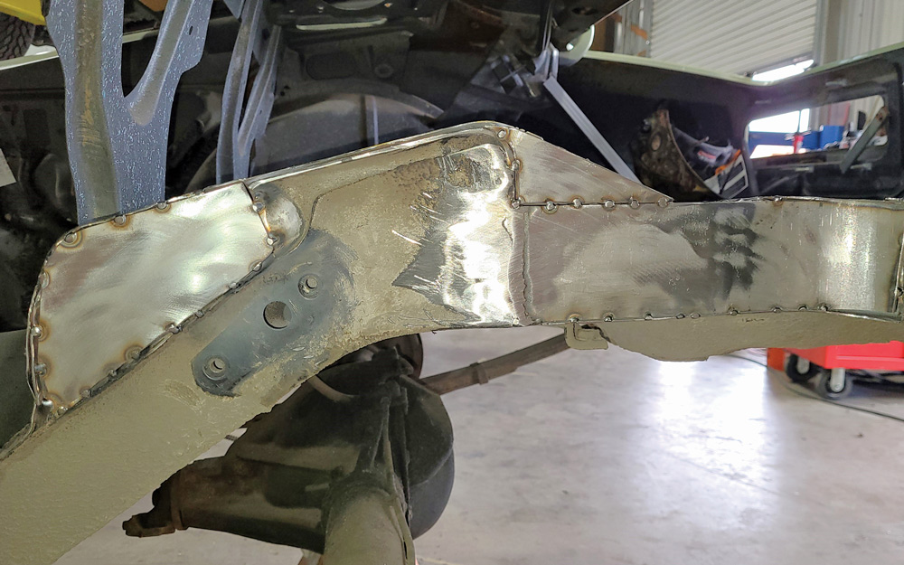 Two of the provided plates can be tacked in place with the rear piece first needing to be shaped a bit to provide the needed curve. This rear piece is also a different shape from the one needed for the passenger side.