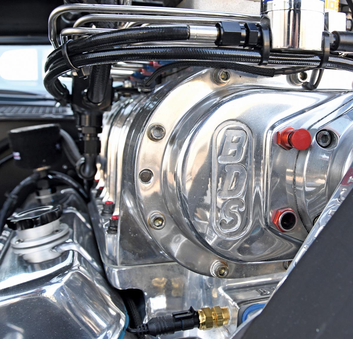 close up front view of the Pro Street ’71 Camaro's BDS 8.71 blower