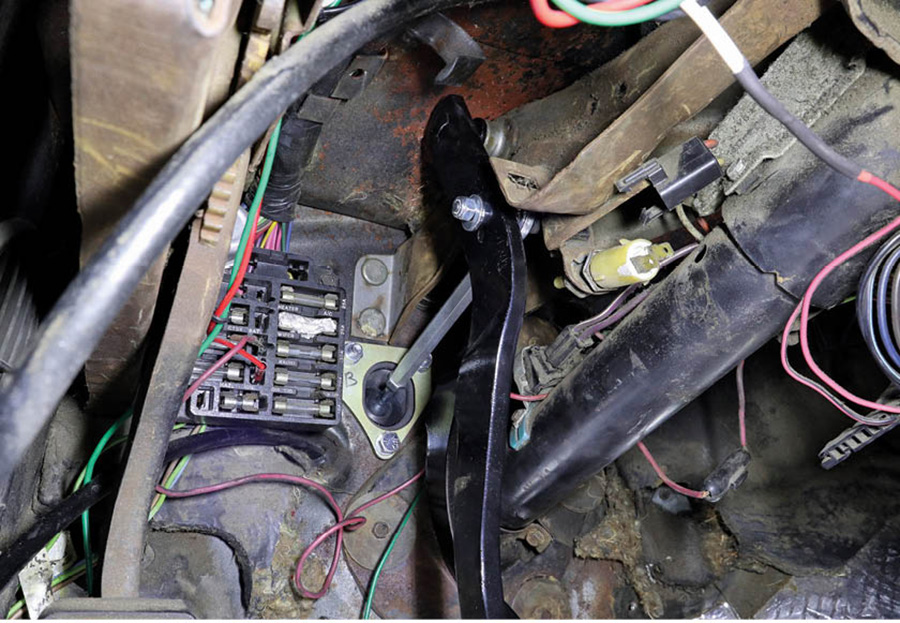 Here’s a look at the backside of the clutch master cylinder and pushrod installed. It’s important to get the pushrod adjusted correctly to allow for complete travel of the hydraulic master cylinder. When trying to bleed the system, if the pedal can’t come all the way to the top or be pushed until it bottoms out, you’ll end up with air in the lines.