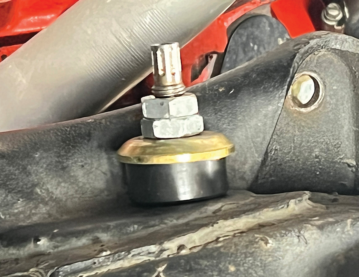 Two nuts securing the top of the Aldan coilover