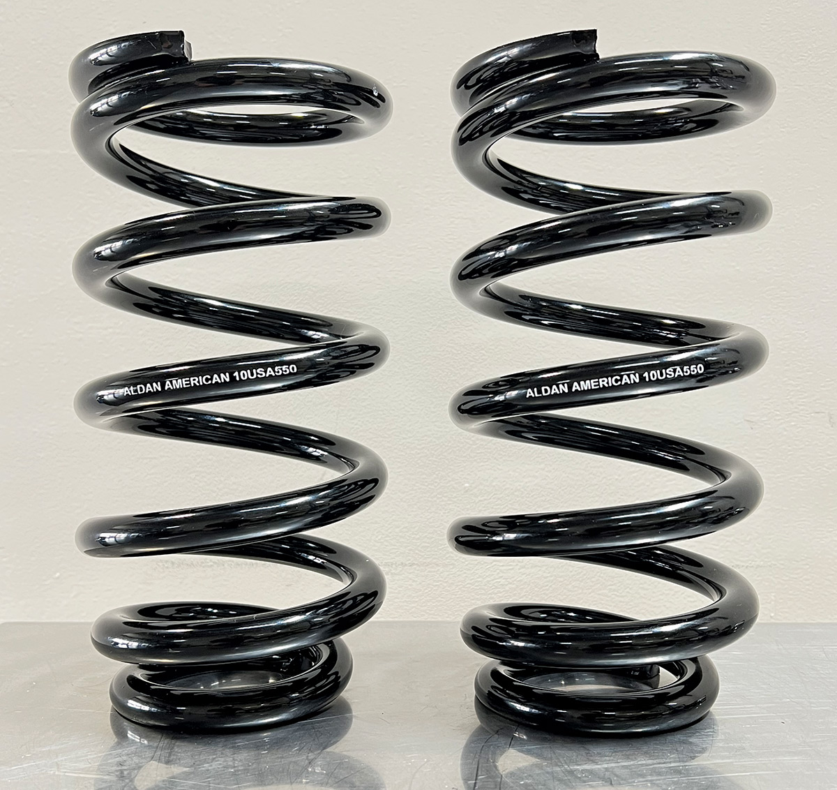 Photo of 2 black Aldan coilover springs