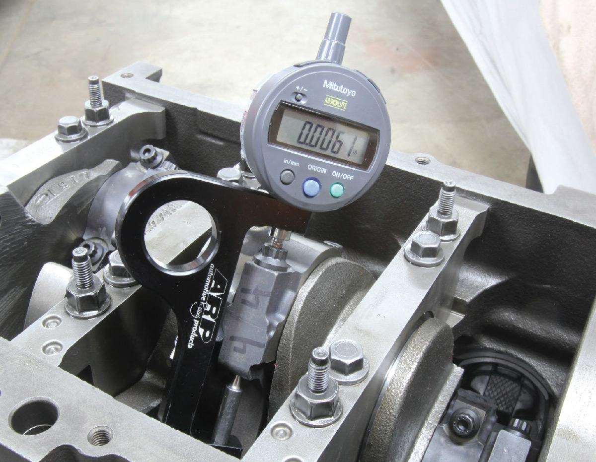 Most quality aftermarket connecting rods now use ARP rod bolts. These bolts can be torqued, but the most accurate way is to measure the rod bolt stretch. This is a new digital ARP rod bolt stretch gauge, but the traditional dial indicators work just fine.