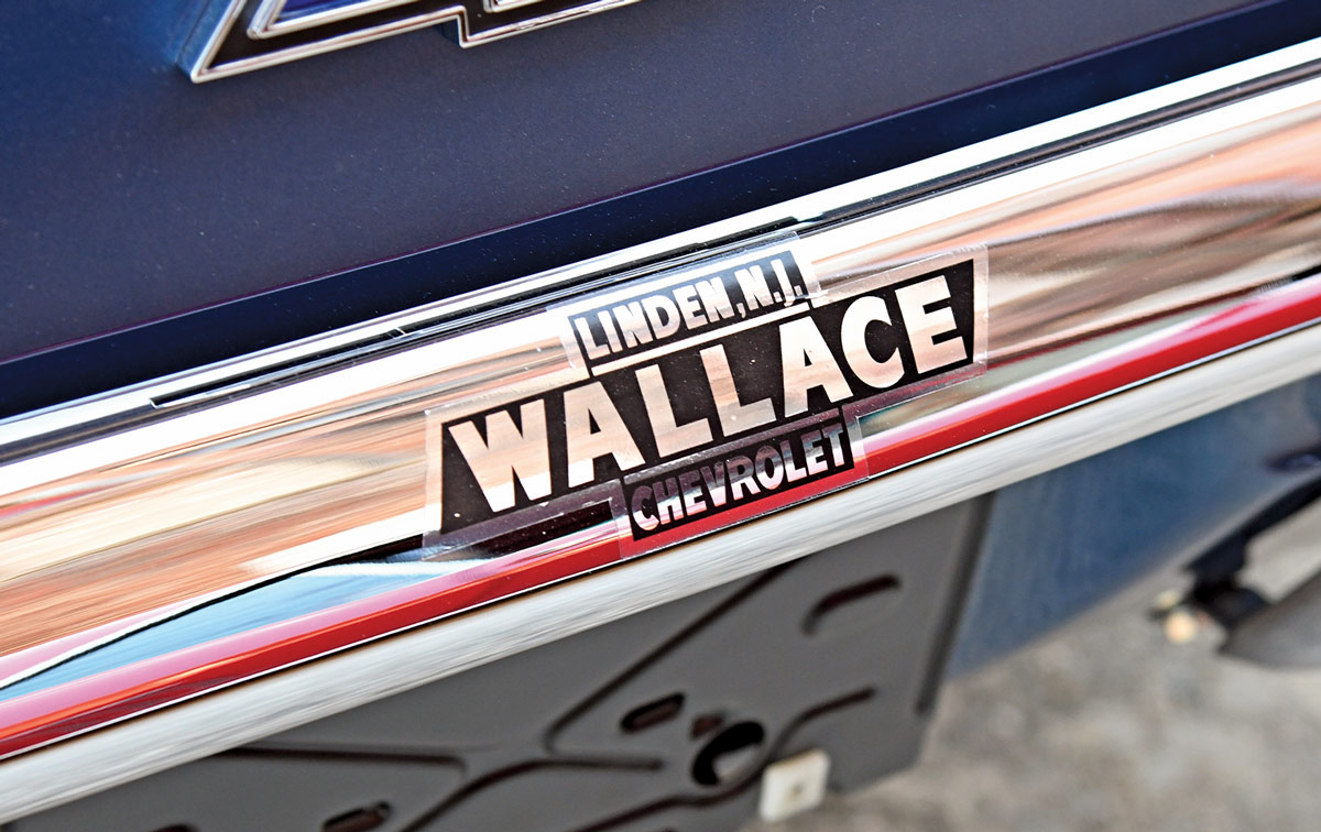 close up of a Linden, N.J. Wallace Chevrolet bumper sticker on the rear of the dusk blue ’69 COPO Camaro