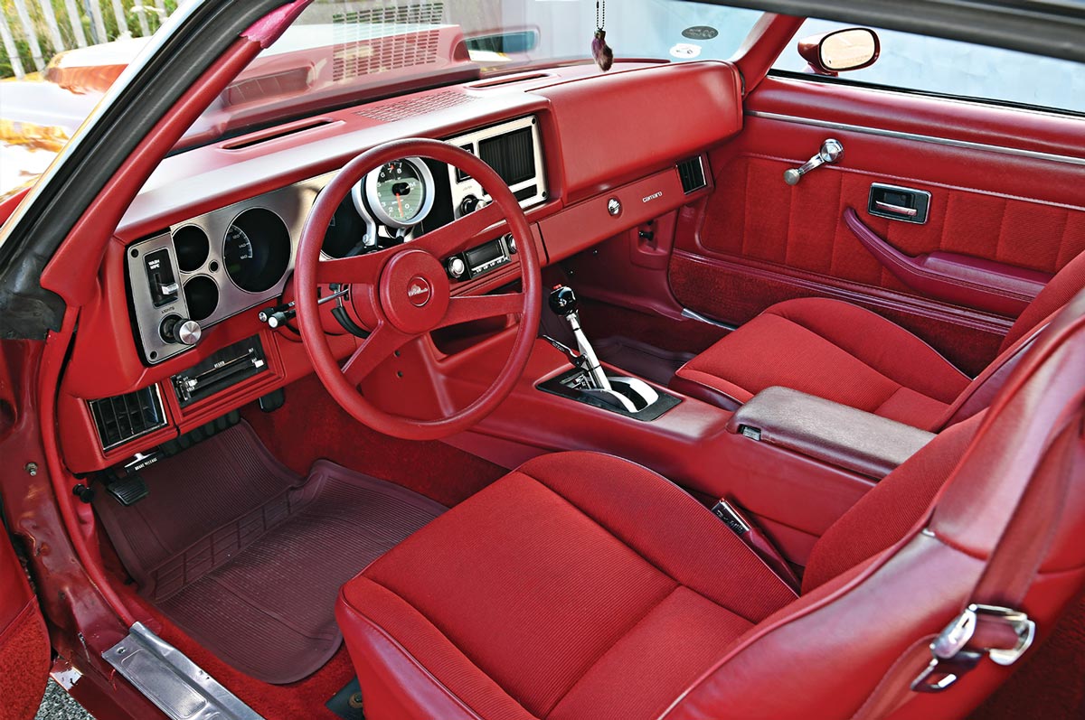 driver side interior view of the Flame Red ’79 Camaro Berlinetta