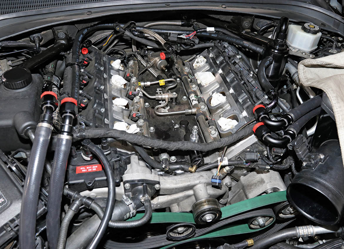 With the intake out of the way, you can see the fuel lines and fuel rails feeding the direct injectors on this LT1 engine. Direct injection is a huge advancement in the evolution of the internal combustion engine, but it does come with limitations that horsepower freaks must overcome.