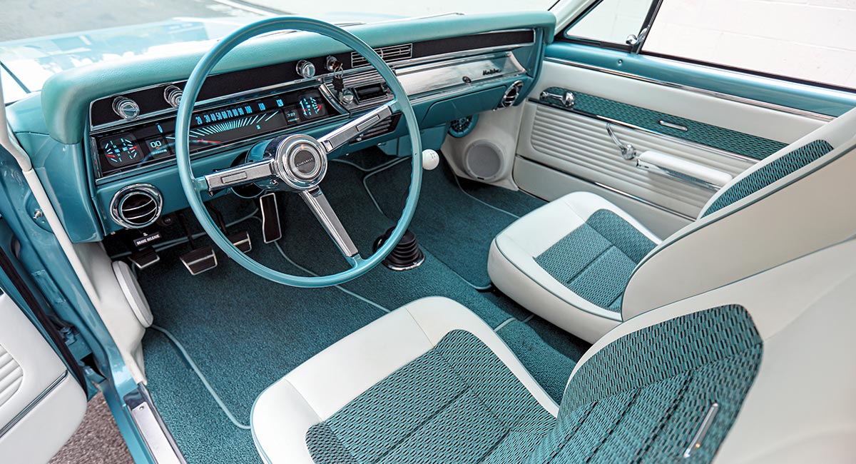 interior view of the ’67 Chevy Malibu from the open driver side door