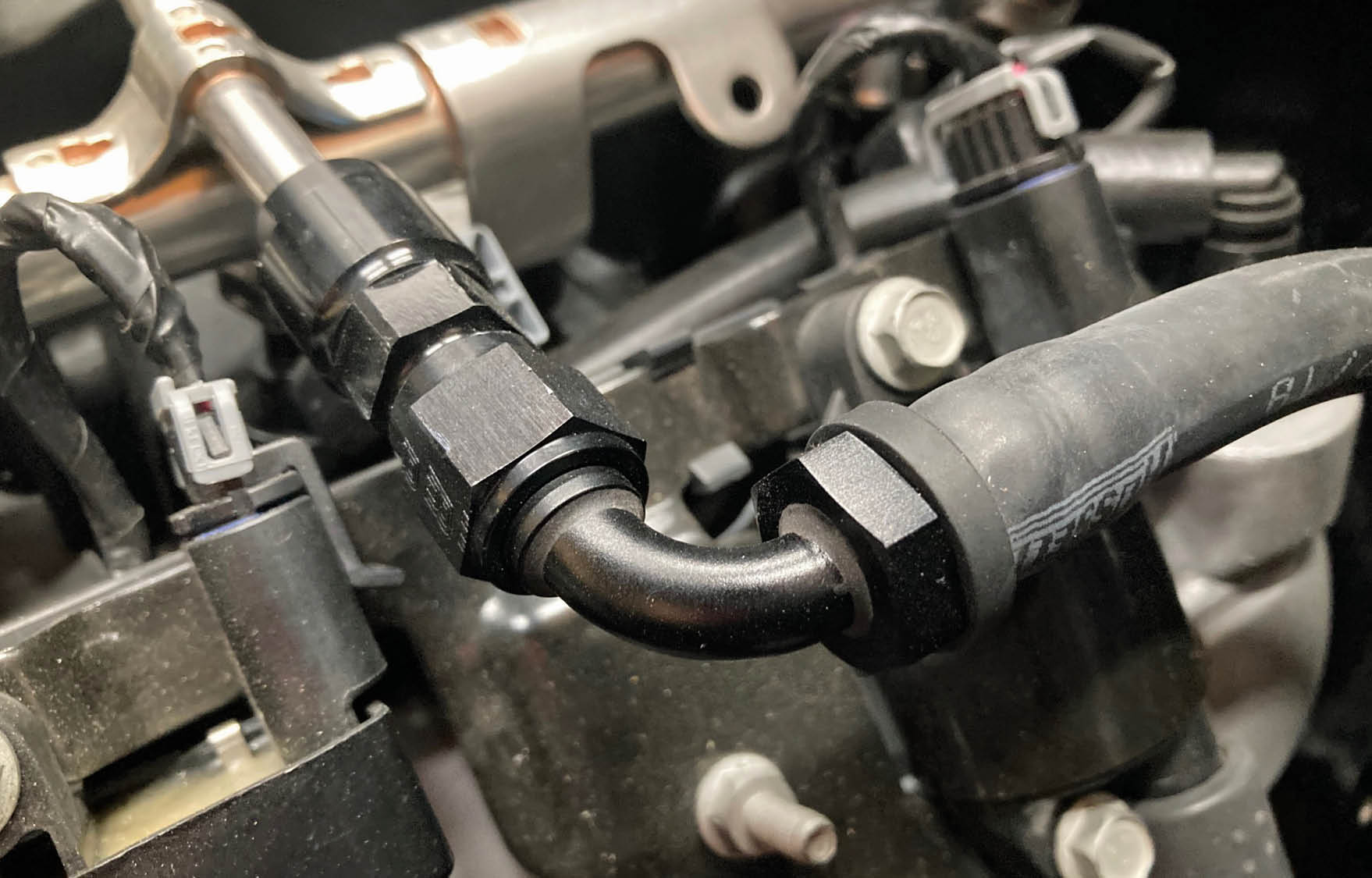 Here’s an example of an assembled AN-6 Twist-Lok assembly from our LS fuel system. The Twist-Lok line is a great alternative to other, more expensive AN systems out there, and the plain rubber hose blends in nicely in any engine compartment.
