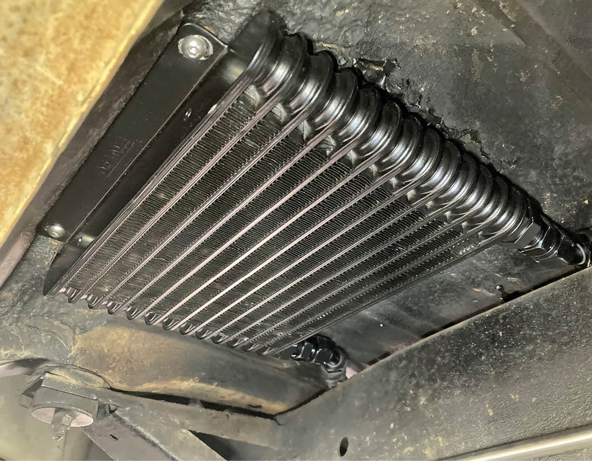 While the engine oil cooler does not feature built-in fans, airflow isn’t as imperative as the trans cooler since its only function is to provide supplemental cooling to the engine, not primary cooling. We opted to install the engine oil cooler in the same location, on the opposite side of the car.