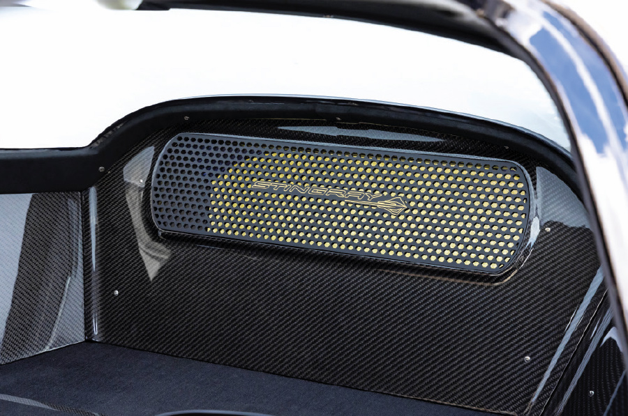 closeup of '67 corvette yellow metal mesh accent