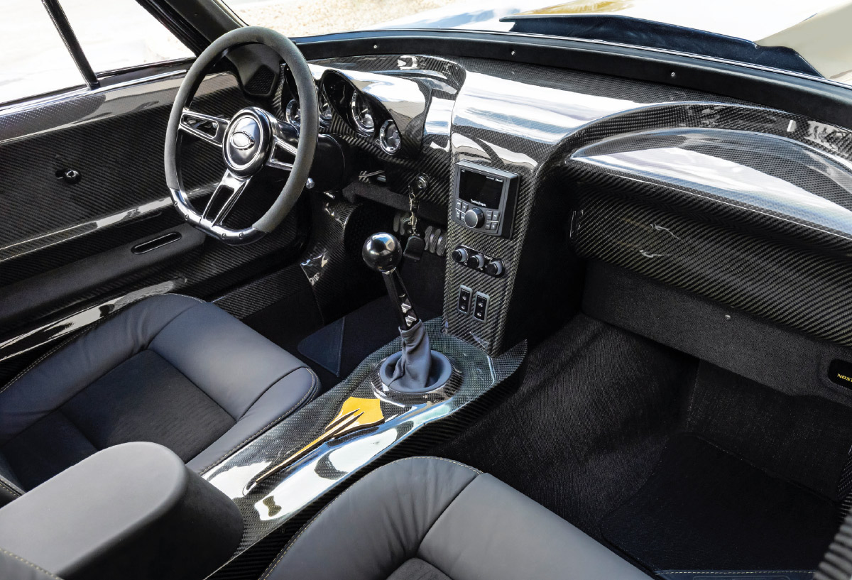 inside view of '67 corvette dashboard and steering wheel