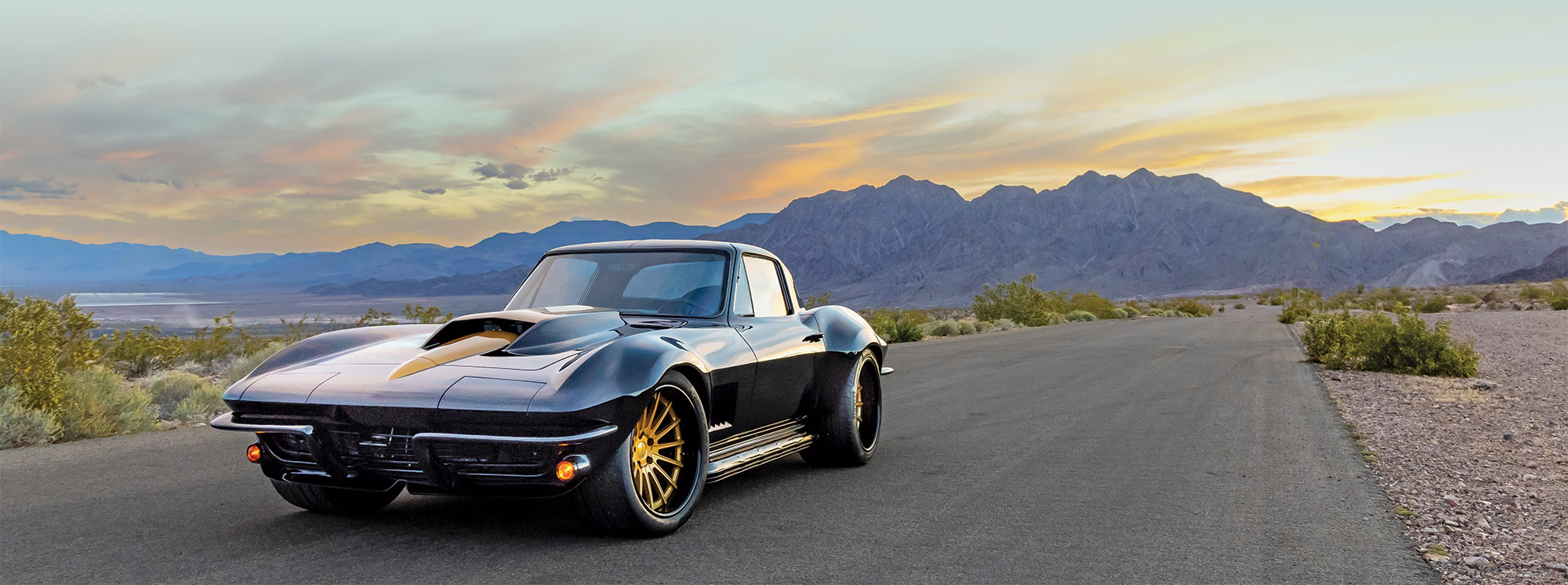 black '67 corvette with yellow accents