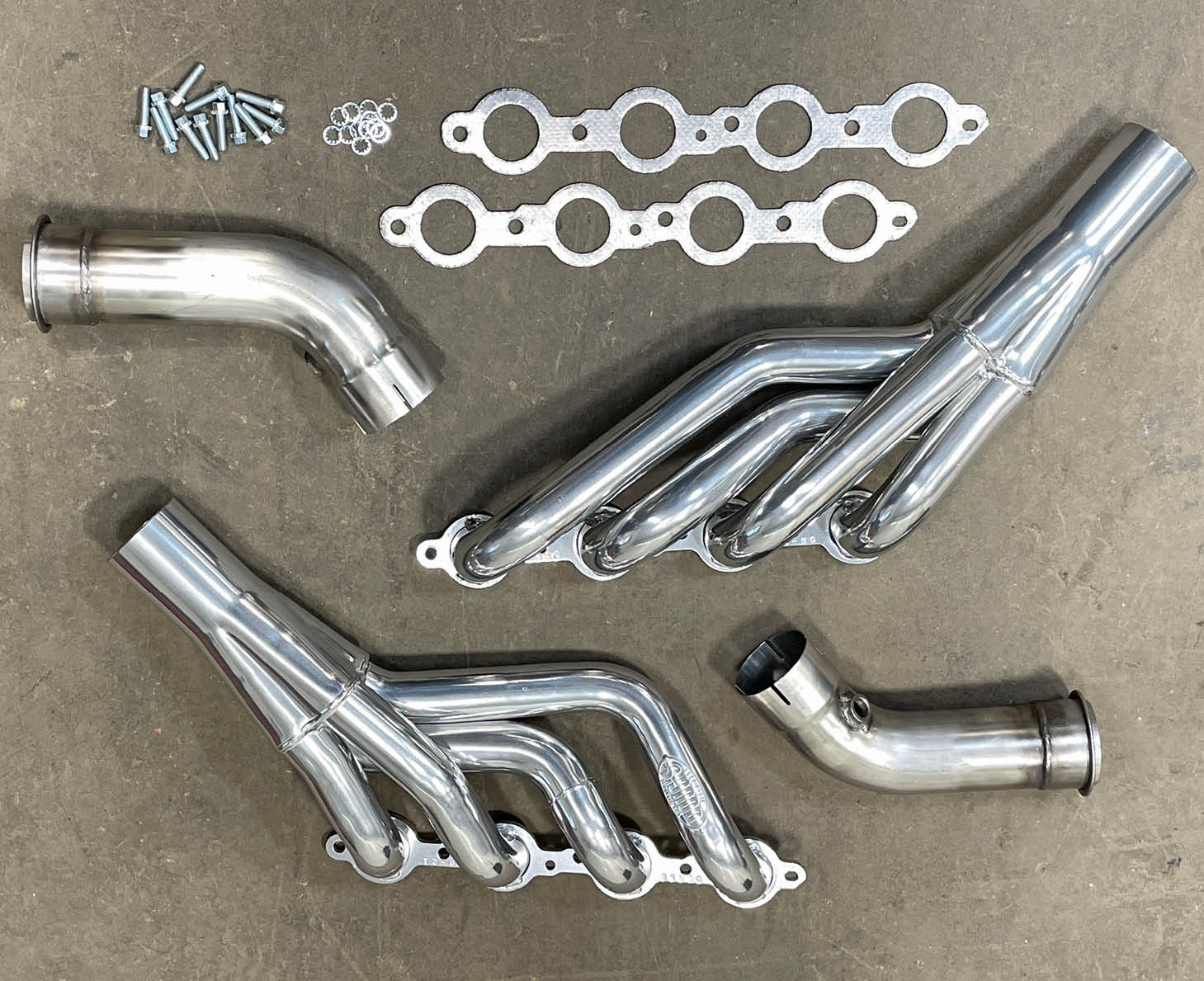 When taking on an LS conversion in a second-gen Camaro, Doug’s Headers has you covered with their “engineered-to-fit” silver ceramic-coated mid-length headers (PN D3358) fashioned from mild steel. Also pictured are their header gaskets, installation hardware (both included in the kit), and 3-inch stainless mid-pipe (PN DMP104).