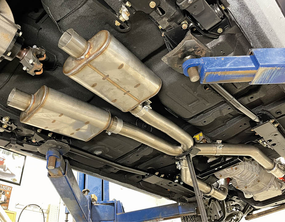 Here you can see the progression of the installation and how nicely its fitment is to the bottom of the car. The mufflers will receive a final adjustment of 15 degrees higher nearest the driveshaft to allow the over-axle pipes and tailpipes into their final position.