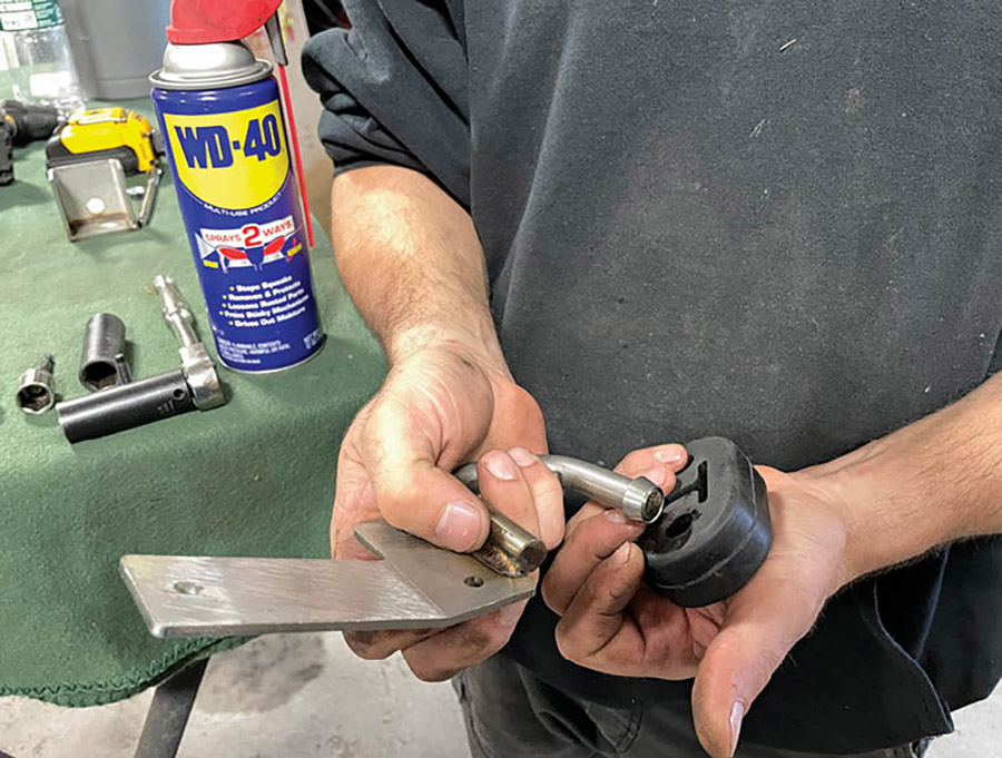 To properly anchor the over-axle pipes, the kit includes a pair of over-axle brackets to mount and stabilize them in place. For ease of installation, it’s recommended to use a lubricant such as WD-40 to aid in mounting the rubber isolators in place.