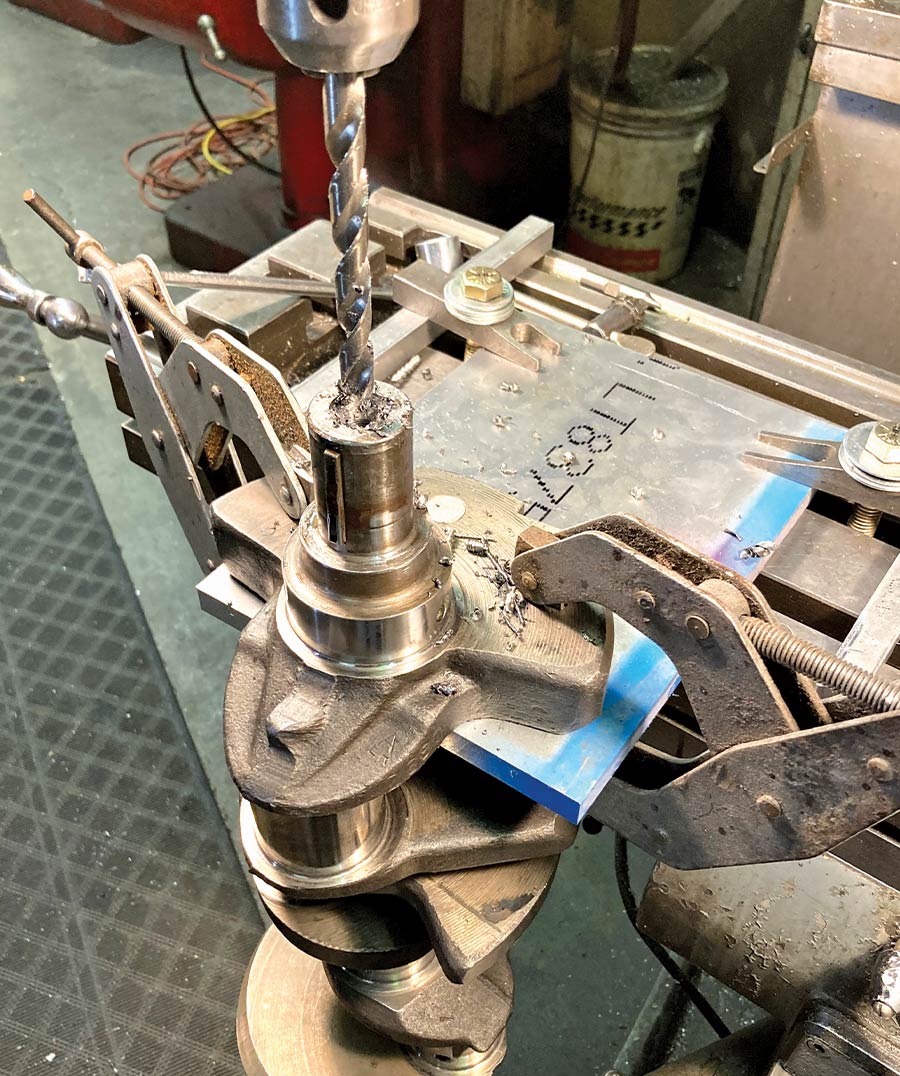 Early small-blocks were not fitted with harmonic balancer bolts, relying on the press fit on the crank snout. We enlisted our local machinist Lucki Candoff to drill and tap our crank for much more security. Plus, we can now use a generic harmonic balancer tool for installing and pulling.