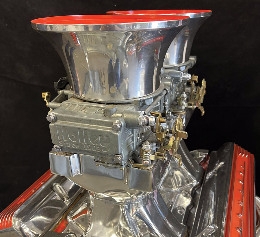 Strope’s goal was an early ’70s look so he polished the Weiand tunnel ram to produce this image topped with a pair of Holley 600-cfm vacuum secondary carbs, velocity stacks, and Corvette cast valve covers.