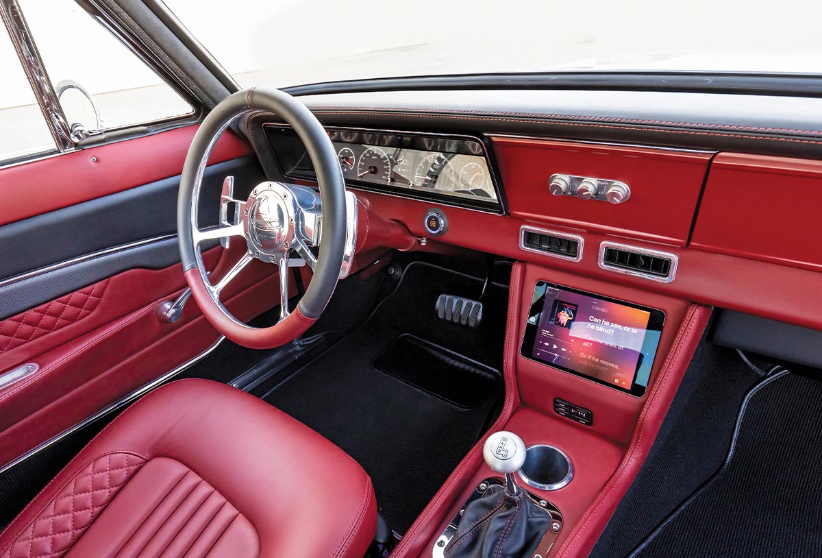 interior view of the ’66 Chevy Nova SS with a focus on the driver side dashboard and steering