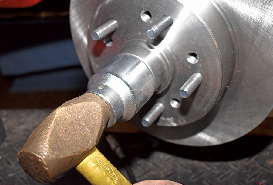 When installing the dust cap use a socket or piece of pipe that pushes on the outer flange.