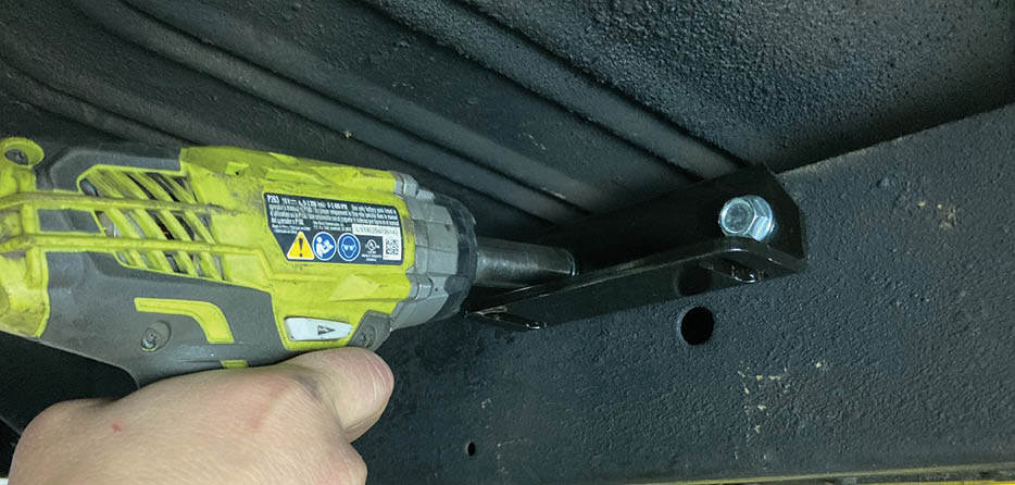 Once square, holes are drilled using a 5/16-inch drill bit into the frame to accept ³/8-16-inch thread forming bolts.