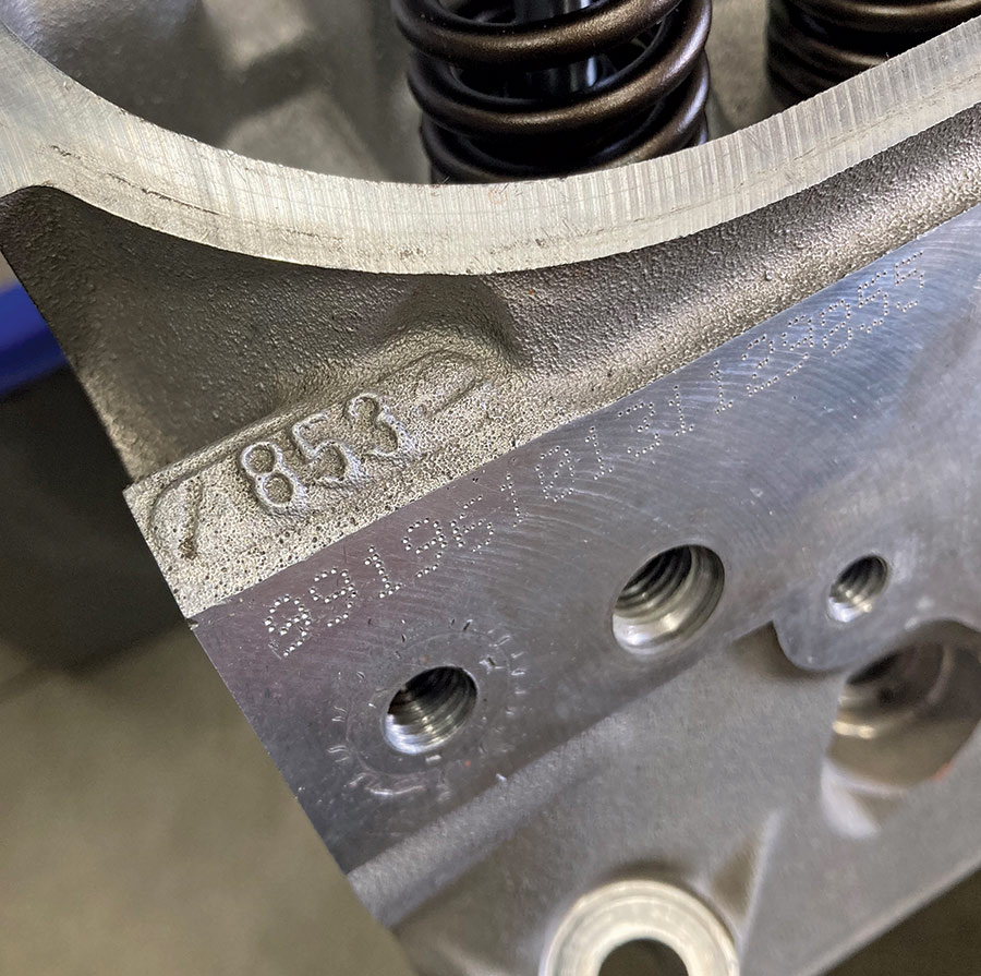 closeup of 853 casting number on the cylinder head