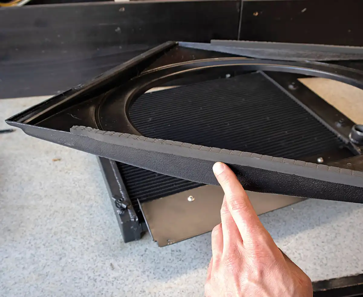 We used adhesive-backed foam weatherstripping around the outer edge of the shroud to create a tight seal. This would ensure the fan could create vacuum and pull cool air through the entire surface of the fan shroud.