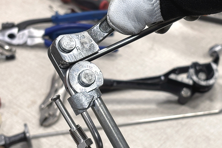 The new measurement mark is lined up with the 0-degree mark on the bender