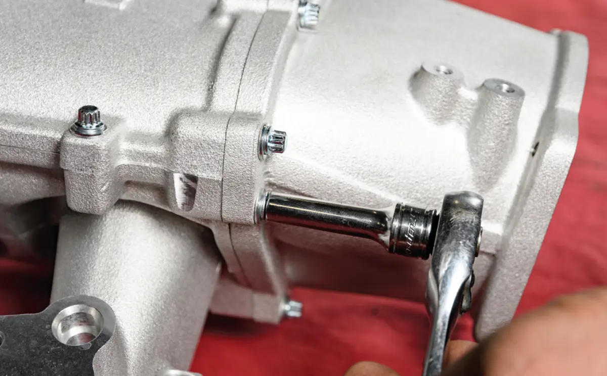a throttle body adapter bolt is tightened